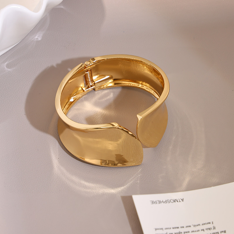 The Concave Flared gold Cuff